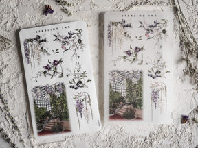 Botanical sticker sheet featuring elegant arrangements of purple wisteria, ornate garden arches, and delicate floral bouquets for May 2024 crafting.