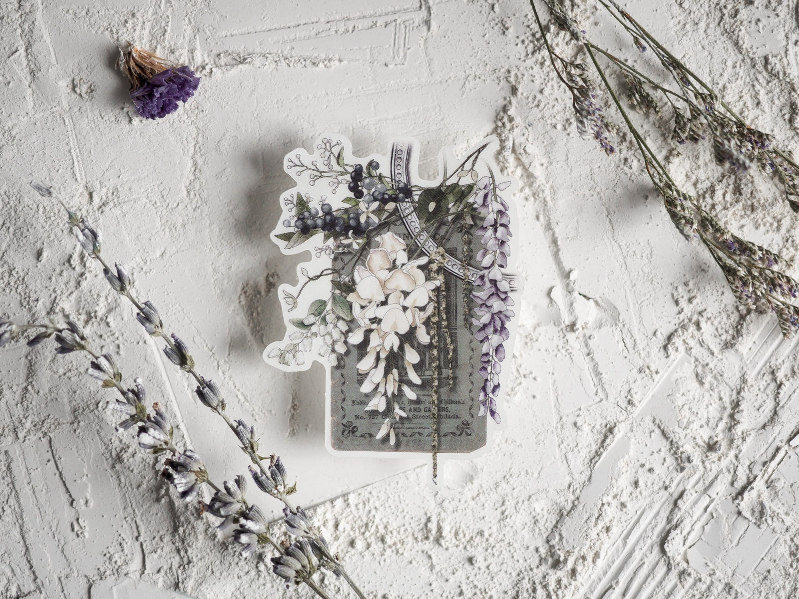 Clear vinyl die-cut sticker featuring a decorative May 2024 botanical design, showcasing lush white blossoms, leafy vines, and elegant floral elements.