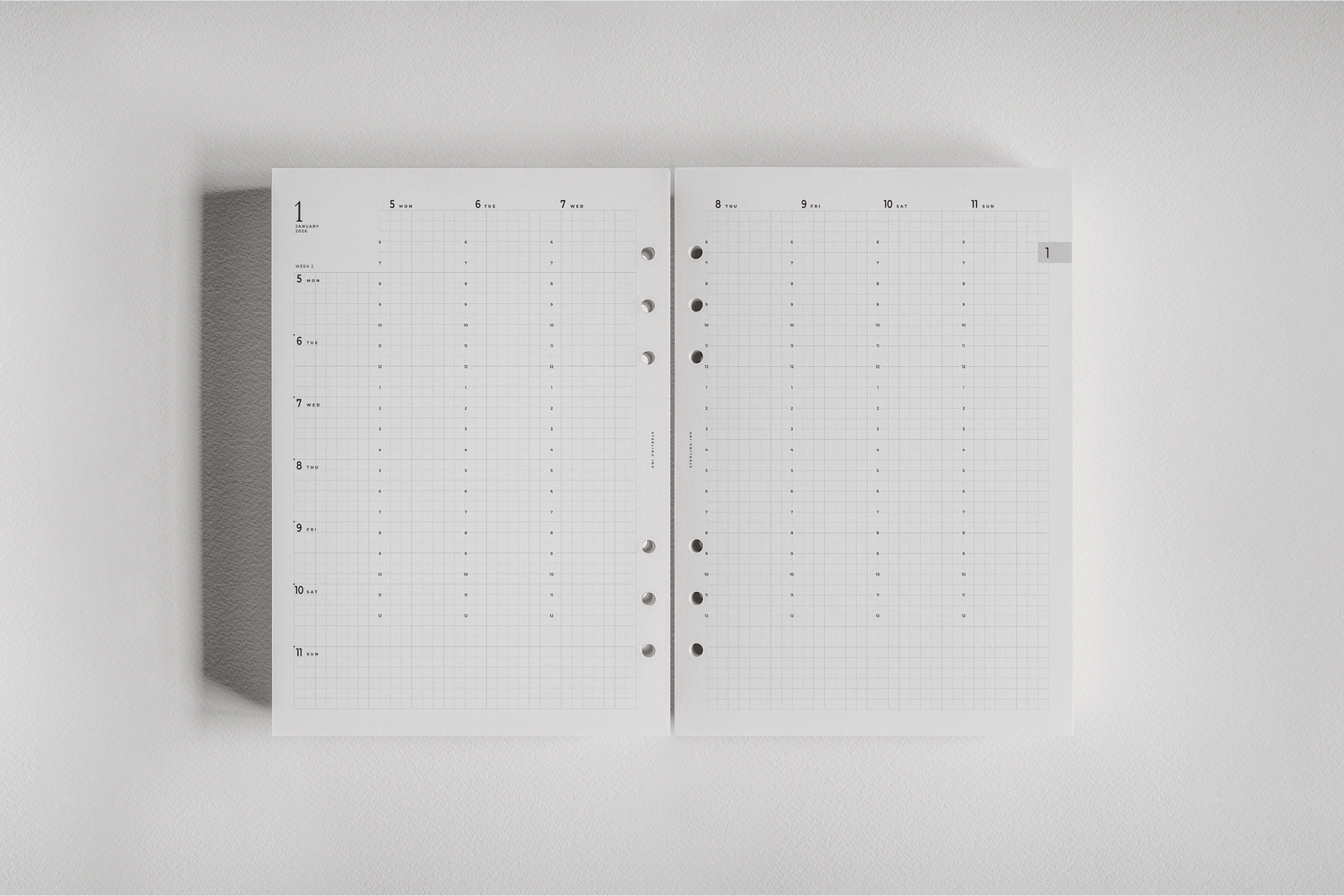 Minimalist white weekly planner insert featuring a flexible, dated grid layout for comprehensive 2026 scheduling and organization.