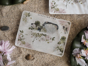 Elegant watercolor botanical sticker sheet featuring soft pink peonies and delicate greenery accents, highlighted with subtle holographic foil details.