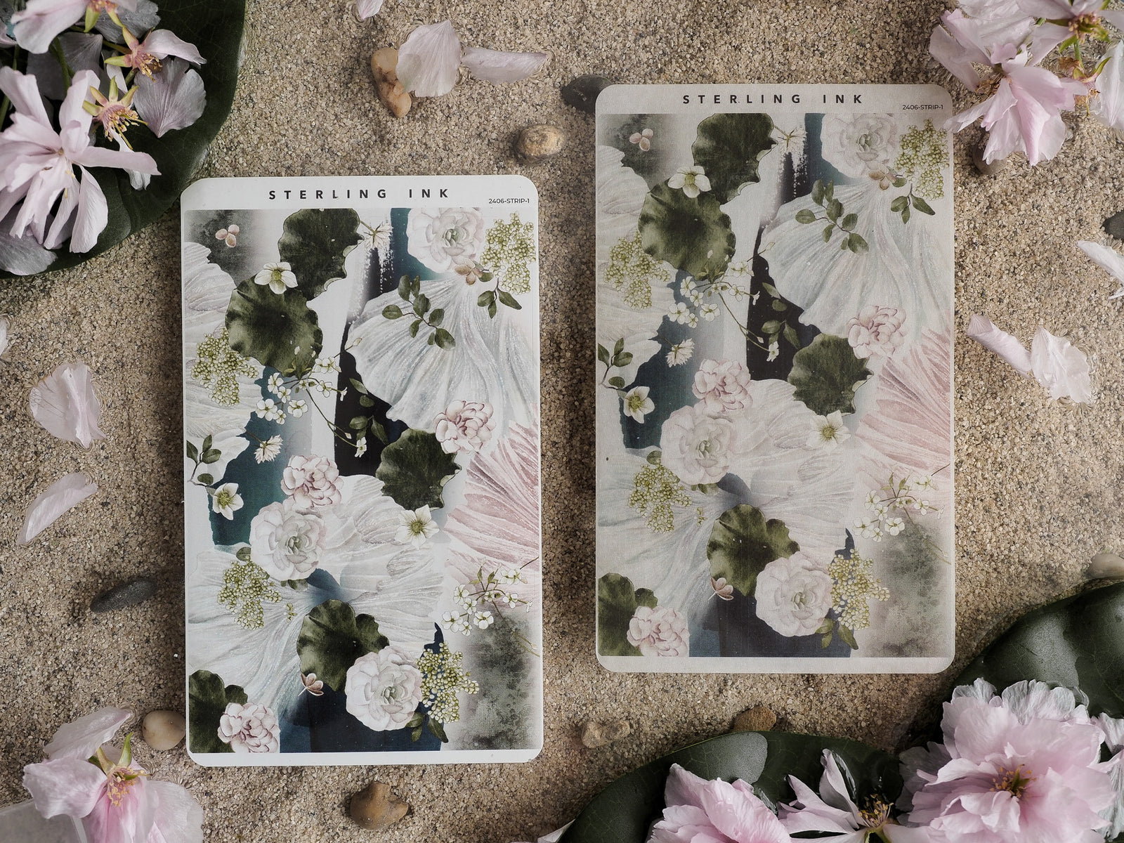Two matching thin stickers featuring lush watercolor botanicals in soft blush pinks, deep greens, and creamy white floral patterns.