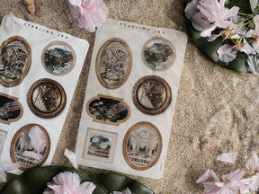 Vintage picture frame stickers featuring detailed, sepia-toned etchings and architectural vignettes perfect for crafting and scrapbooking.