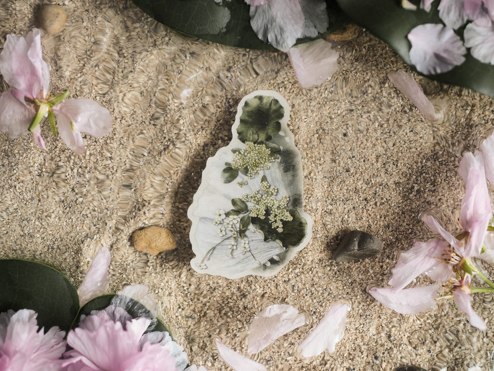 Clear vinyl die-cut sticker featuring detailed waterlily foliage, delicate white filler flowers, and rich botanical art.