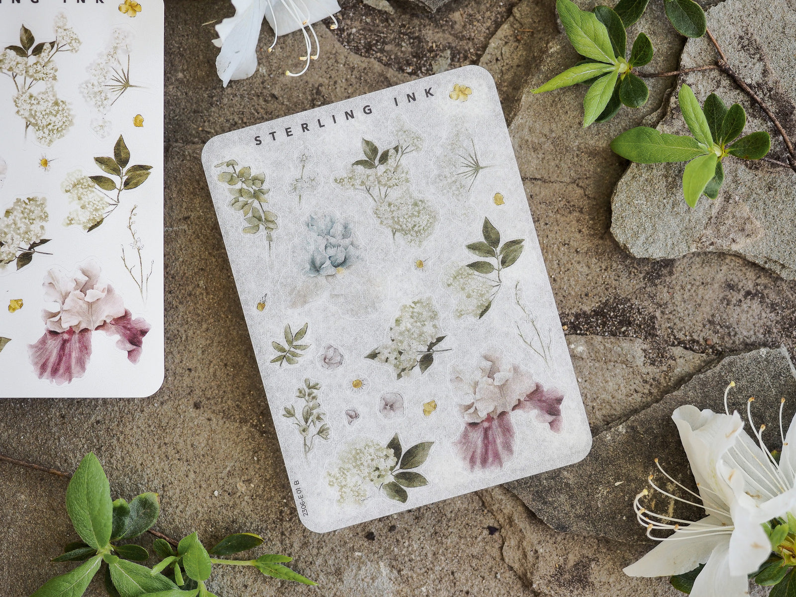 Elegant sticker sheets showcasing a romantic botanical arrangement with soft pastel watercolors of blush, blue, and sage flowers and leaves.