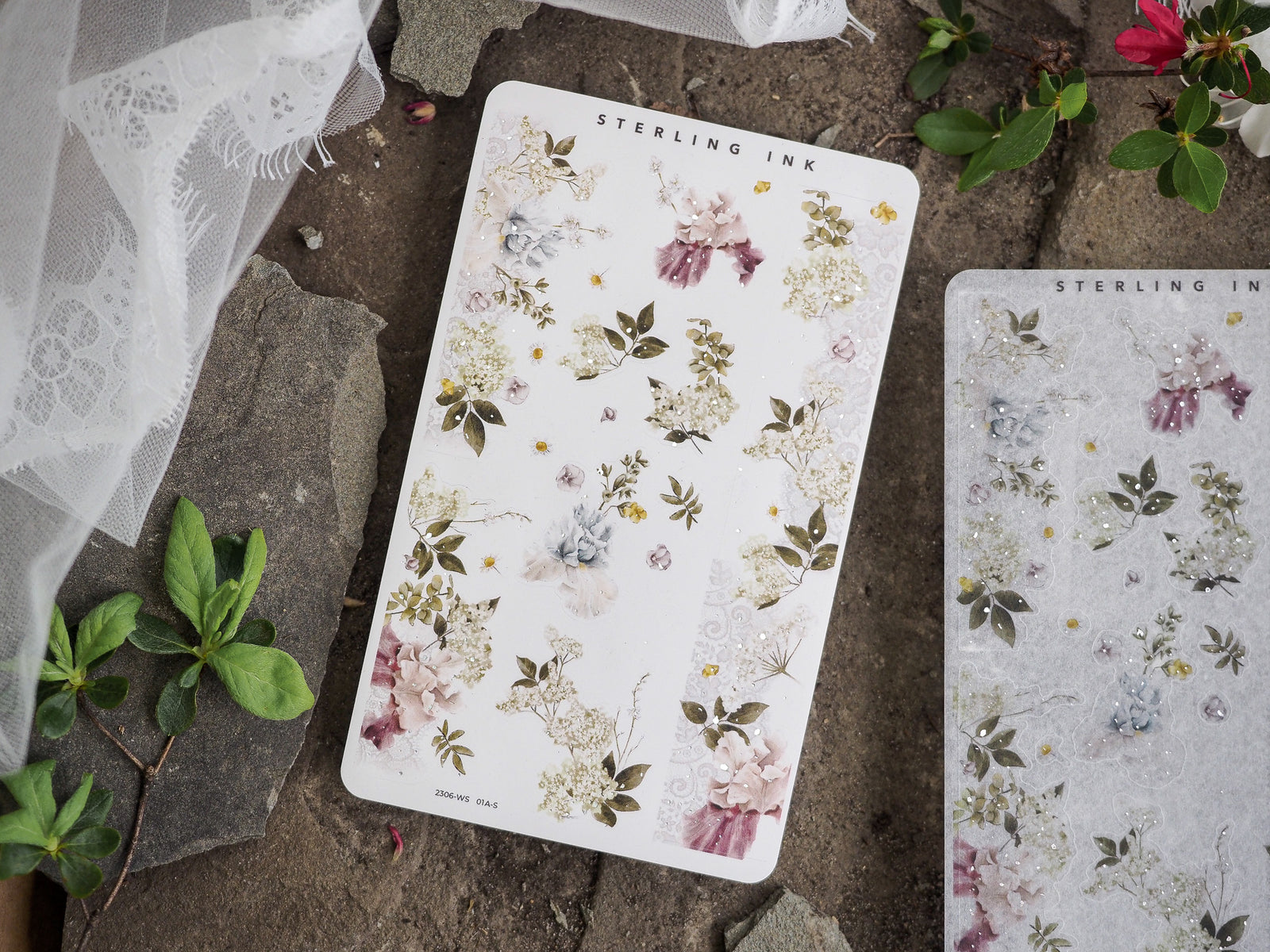 Beautiful sticker sheet featuring watercolor botanical clusters of delicate pastel flowers in blush pinks, dusty lavenders, and sage greens.