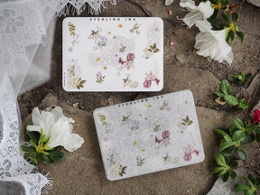 Delicate floral stickers featuring pastel blooms, corner accents, and subtle silver foil details, perfect for adding a delicate touch to journaling and scrapbooking.