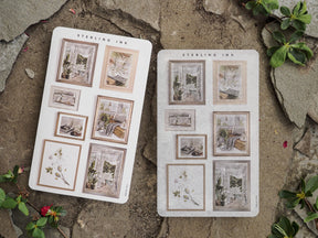 Decorative sheet of Picture Frame Stickers featuring natural scenes, botanical prints, and nostalgic indoor vignettes in rustic, neutral tones.