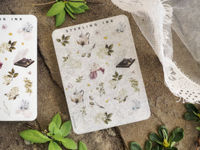 Botanical sticker set featuring delicate watercolor-style elements, including herbs, leaves, dried flowers, and vintage scientific icons.