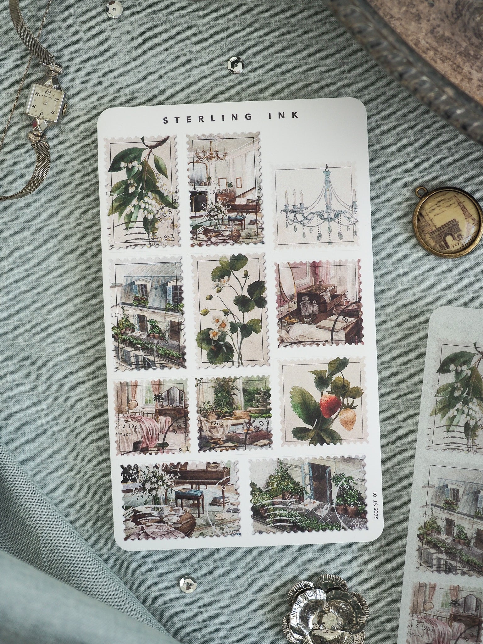 Vintage "Sterling Ink" sticker sheet with an intricate grid of engraved illustrations depicting Parisian architectural scenes, botanical sketches, and elegant vintage interiors.