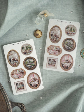 Set of "Sterling Ink" stickers featuring vintage sepia-toned engravings and illustrations of rustic indoor scenes, presented on two decorative card sheets.