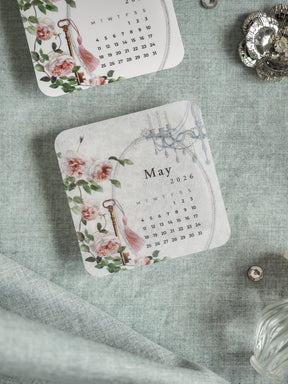Vintage June 2026 floral calendar featuring a delicate watercolor design of soft pink and red roses and greenery.