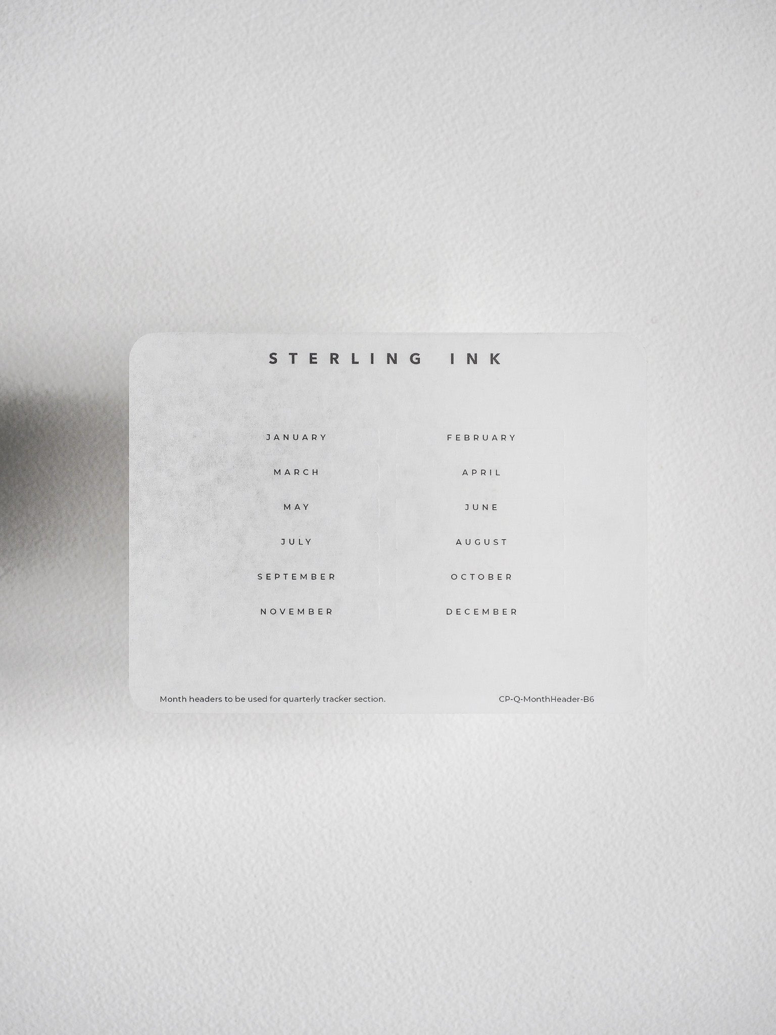 Minimalist printable set of black-text monthly headers for organizing undated planners, listing January through December for easy academic or lifestyle scheduling.