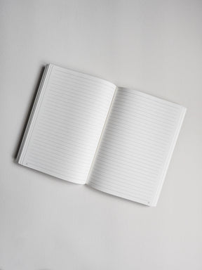 Open B6 notebook featuring hundreds of numbered, lined pages, perfect for writing, journaling, and detailed note-taking.