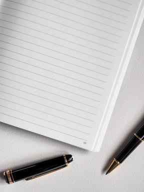 A clean, open A5 notebook displaying 272 ruled pages with visible page numbers for organized writing and journaling.