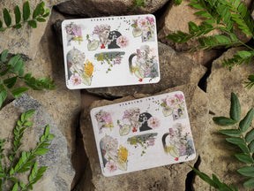 Detailed sticker sheets featuring watercolor bouquets, delicate floral accents, and soft, vintage portrait elements in pink, yellow, and green.
