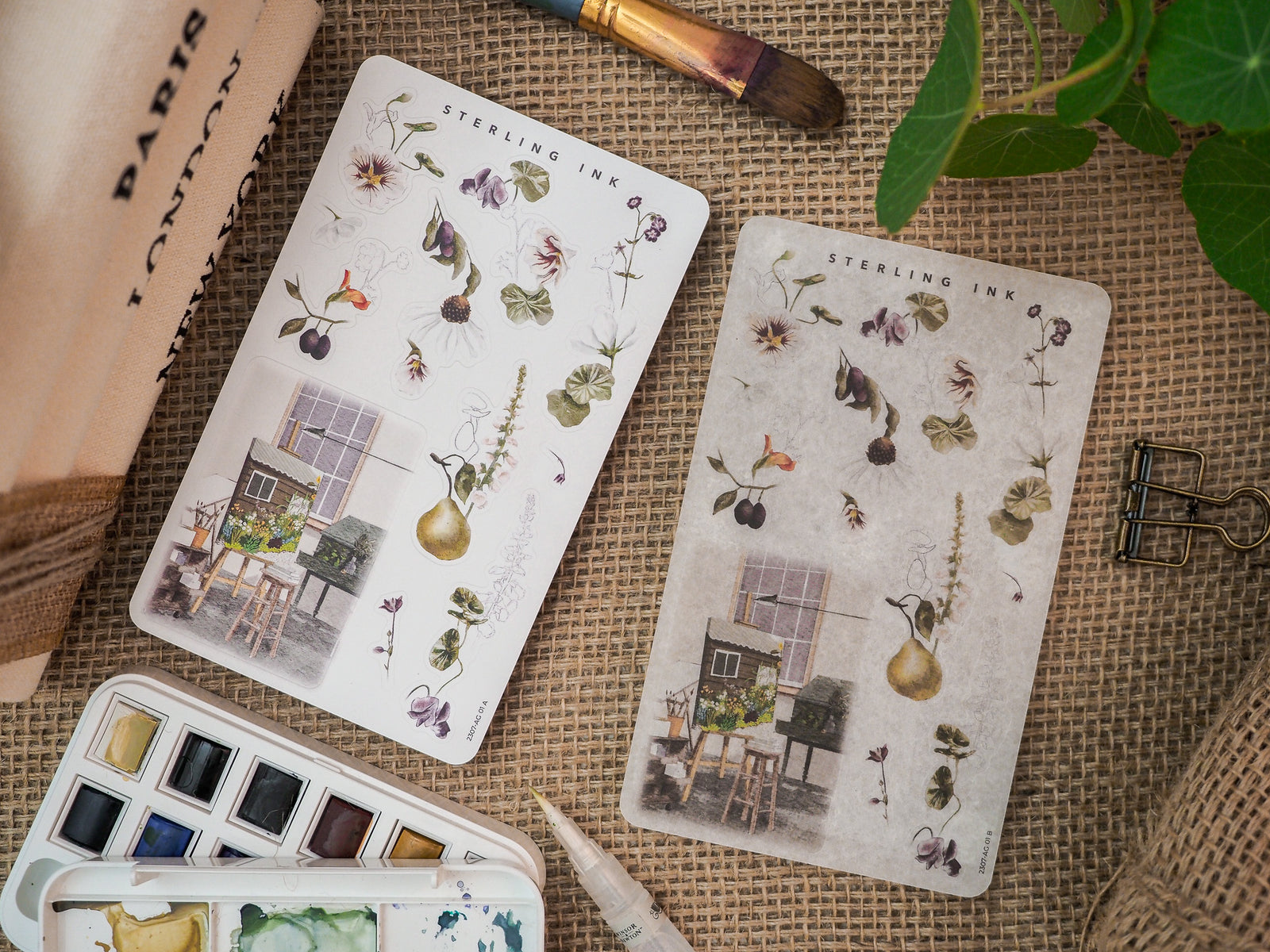 Botanical sticker sheets featuring soft, muted illustrations of herbs, delicate flowers, and charming little cottage garden arrangements by Sterling Ink.