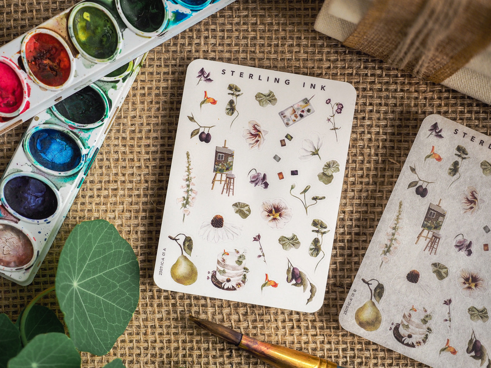 Mini icon stickers featuring a whimsical collection of botanical elements, tiny rustic houses, delicate flowers, and autumnal seasonal sketches.