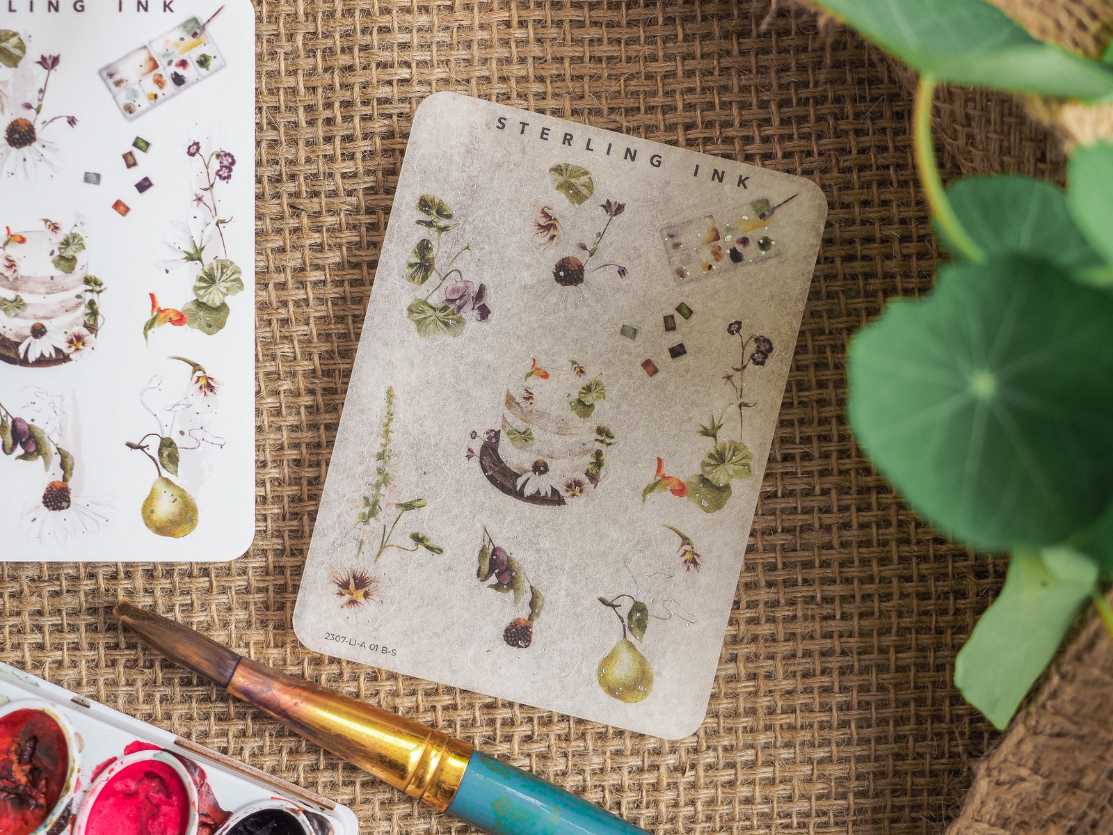 Vintage sticker sheet featuring detailed botanical and scientific icons, including sketches of flora, insects, and natural elements for journaling.