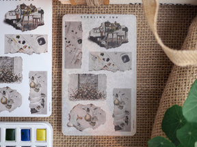 Rustic scrapbook stickers designed as aged torn paper clippings, showcasing detailed vintage sketches of architecture and botanical illustrations.