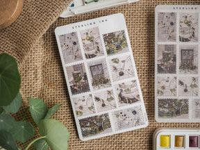 Vintage sepia Stamps Stickers - July 2023 sheet featuring detailed architectural sketches and botanical designs perfect for scrapbooking and journaling.