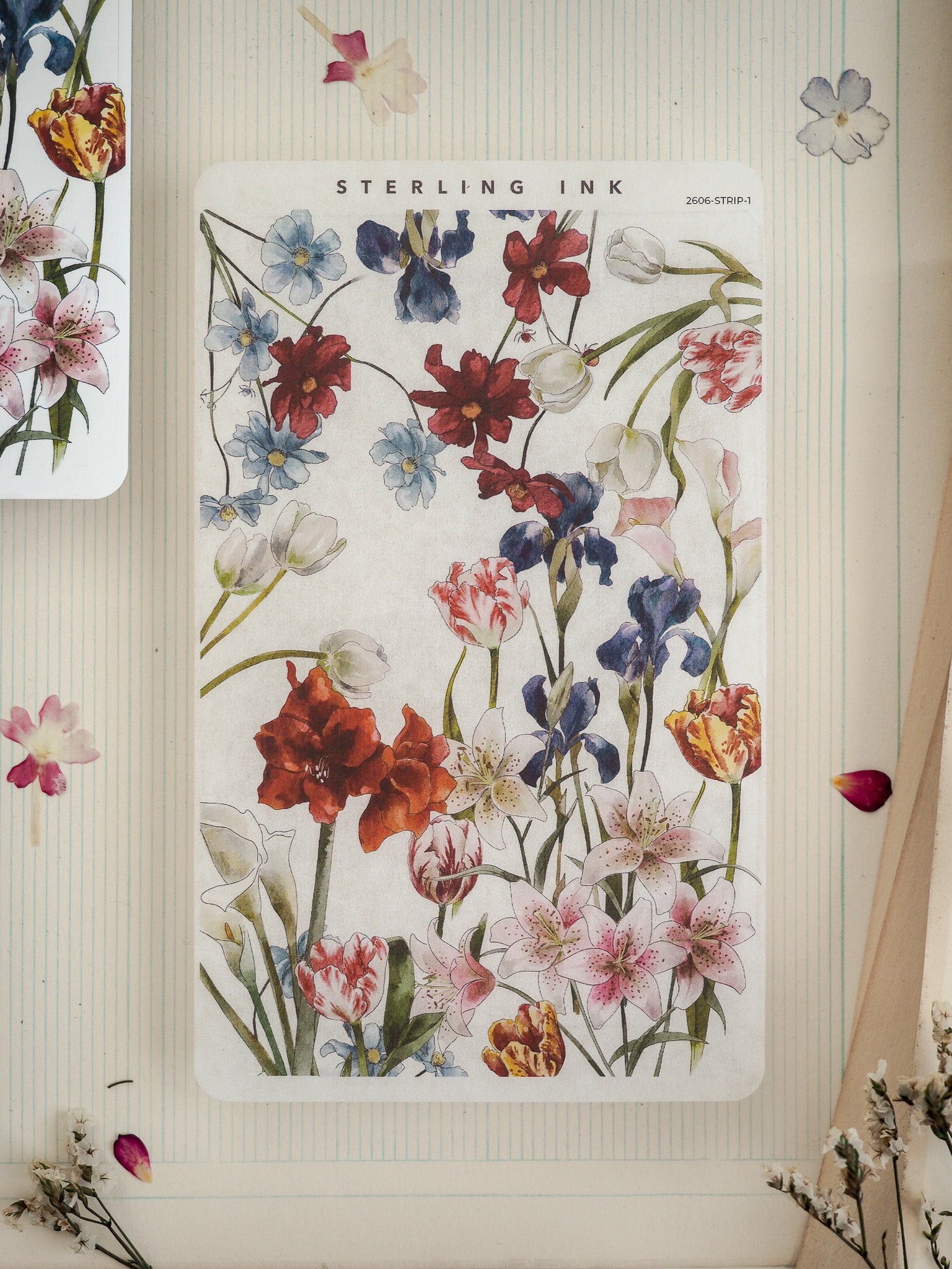 Lush watercolor floral sticker featuring a detailed, vibrant bouquet of pink, blue, red, and cream blooms on a clean white background.