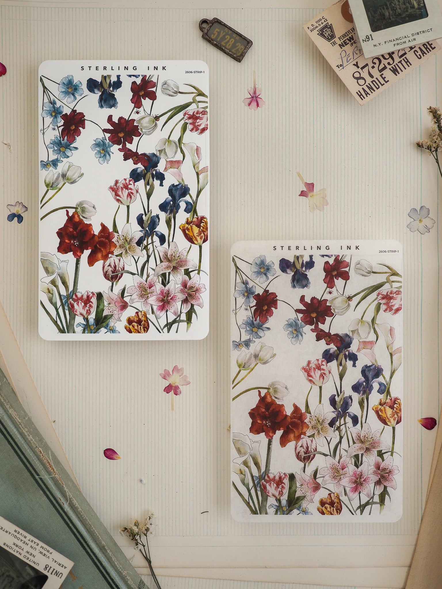 Set of two watercolor floral stickers featuring rich blooms of red, blue, and pink wildflowers, designed for journaling, scrapbooking, or crafting projects.