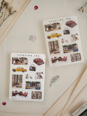 Set of "Sterling Ink" sticker sheets with vintage illustrations of retro items, including classic yellow cars, typewriters, and nostalgic architectural scenes.