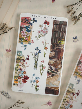 A craft sheet featuring a vibrant collage of watercolor flowers above a detailed illustration of a vintage, dark wood library bookcase, perfect for floral and scholarly themes.
