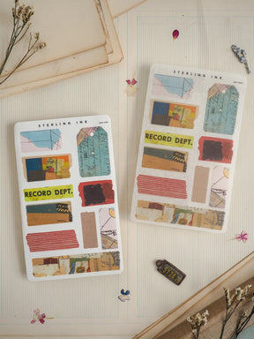 Scrapbooking washi tape sets featuring distressed, vintage filing labels and papers labeled "Record Dept." in muted, aged tones.