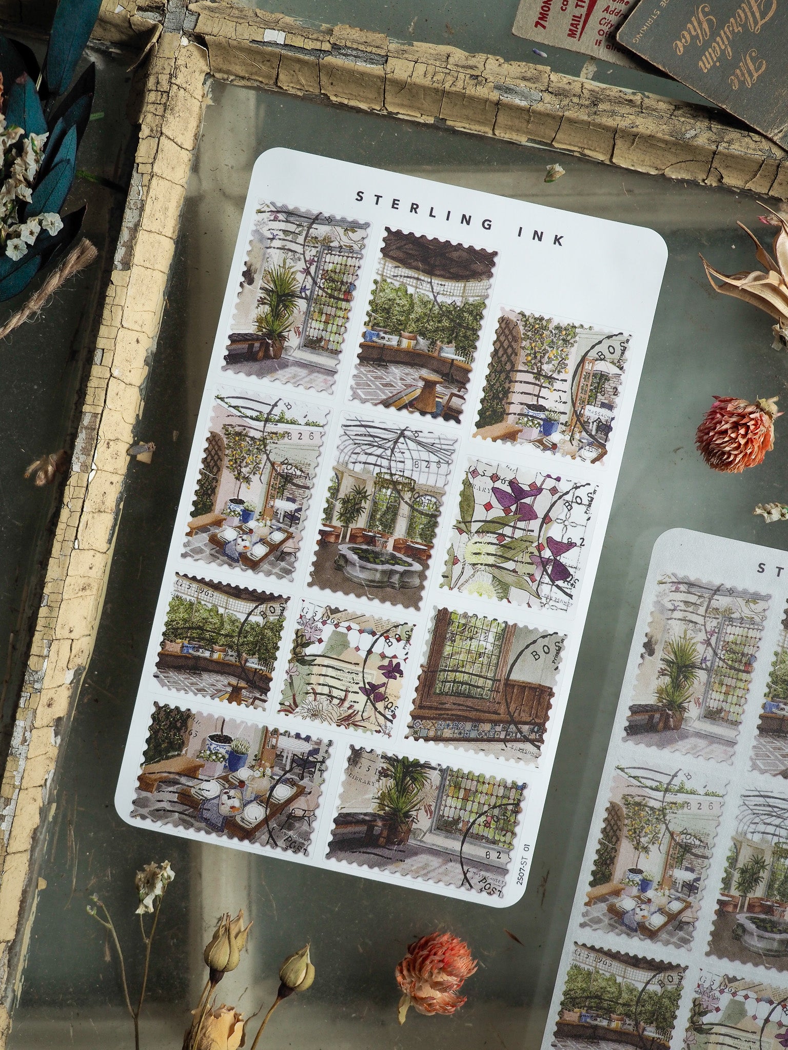 Vintage-themed sticker sheet labeled "Sterling Ink," featuring a grid pattern of botanical stamps depicting lush, overgrown greenhouse and conservatory interiors.