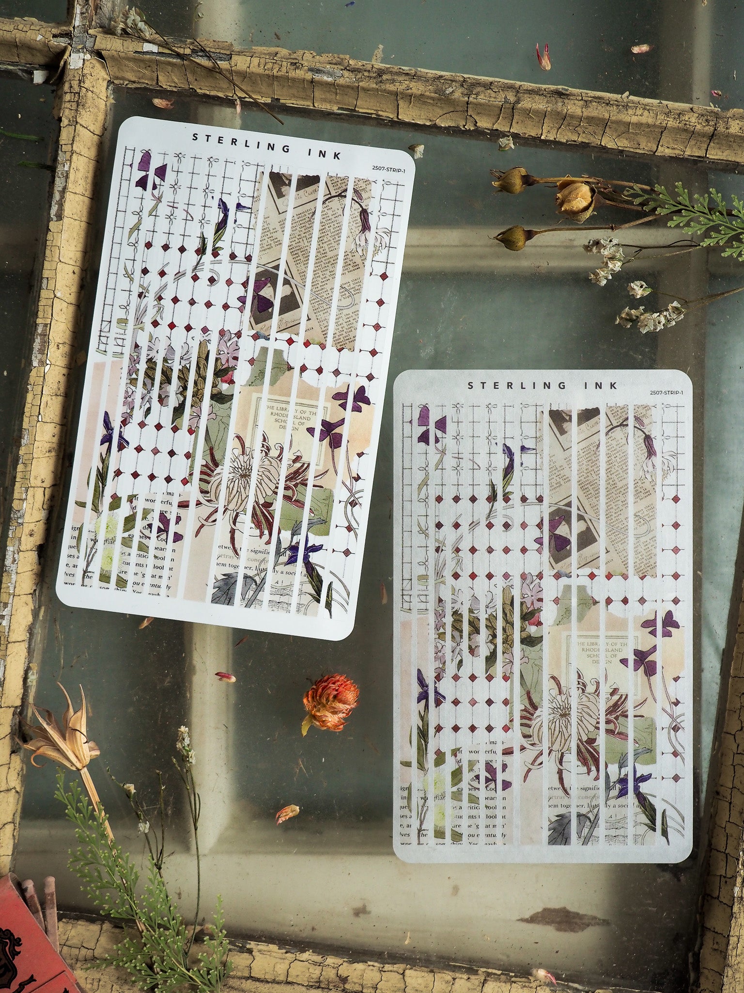 Sheet of thin strip stickers featuring intricate, muted botanical designs, including detailed floral clusters and assorted decorative patterned strips.