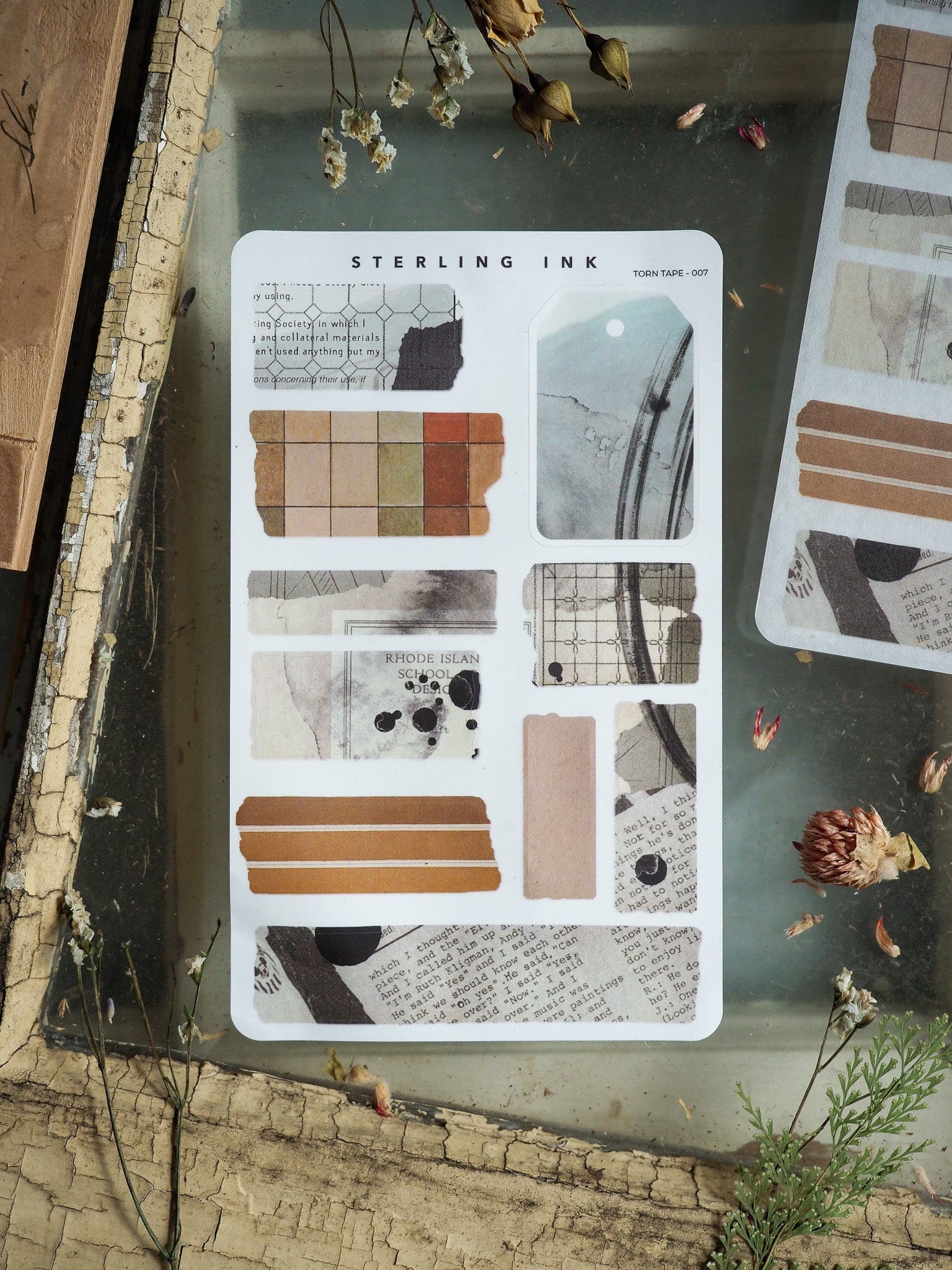 A sheet of distressed, sepia-toned torn tape stickers featuring varied rectangular patterns, grid designs, and aged paper elements for crafting and journaling.