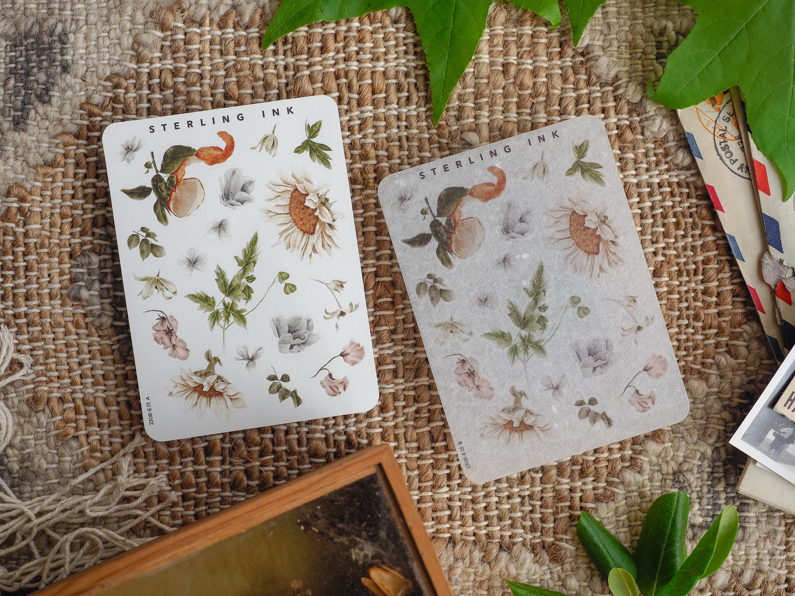 Sticker sheets featuring August botanical elements, including sunflowers, diverse florals, and delicate green foliage, perfect for journaling and crafting.