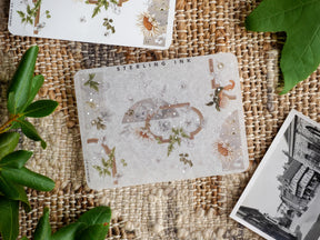 Decorative edges and corners stickers featuring delicate floral wreaths, detailed arches, and shimmering silver foil accents.