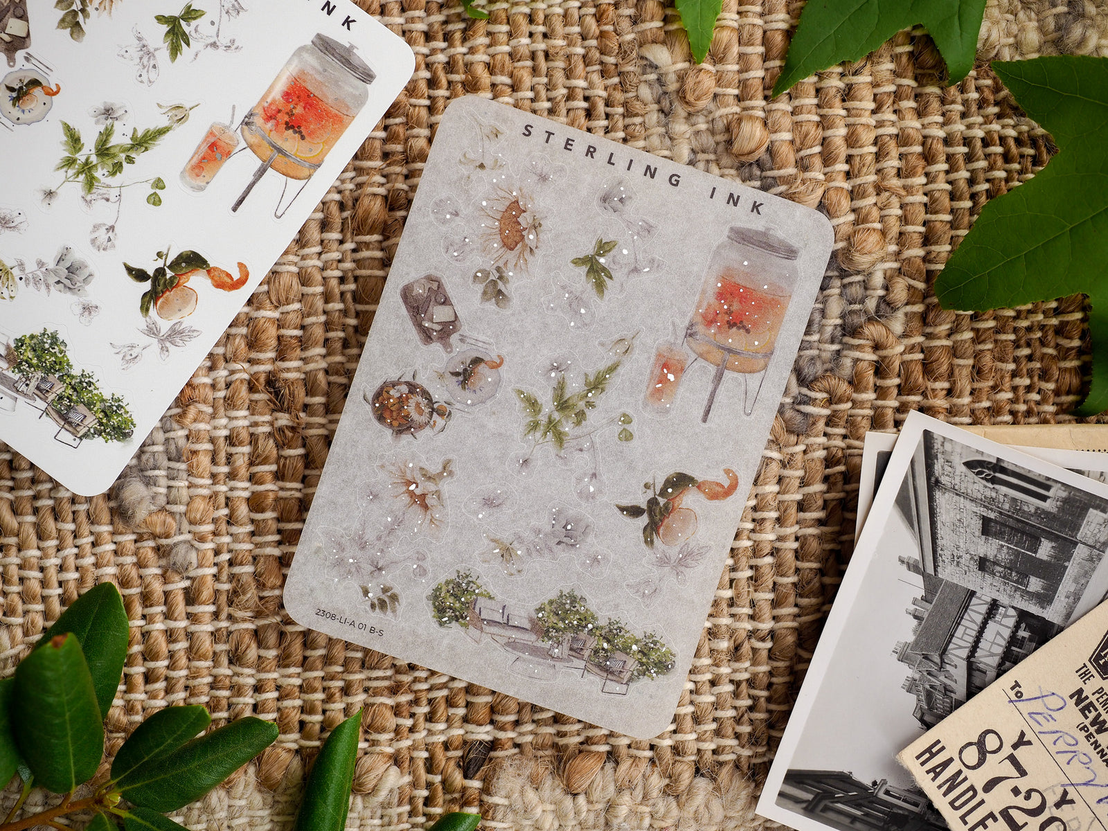 A whimsical sticker sheet featuring delicate botanical icons, including potted plants, acorns, rustic jars, and natural vignettes arranged on a light background.