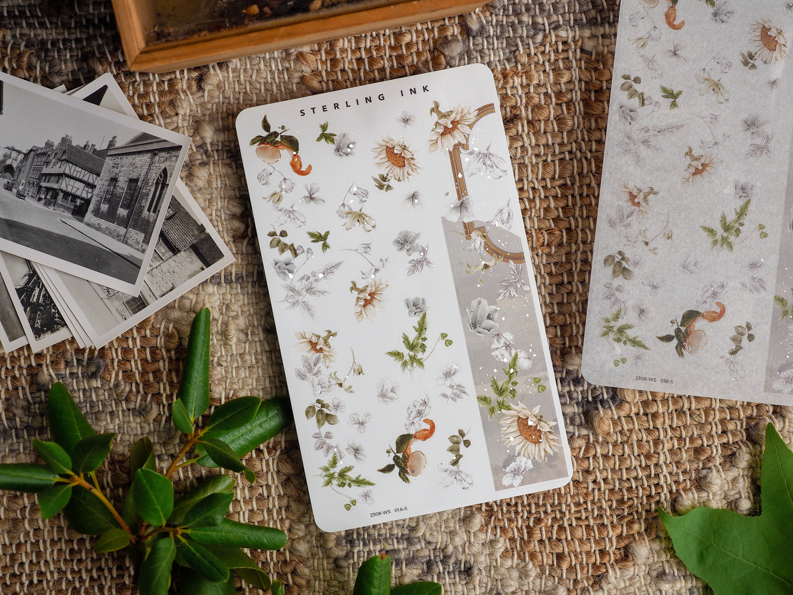 Botanical washi strip stickers featuring a delicate pattern of scattered dried flowers, green leaves, and small orange insects on a clean white background.