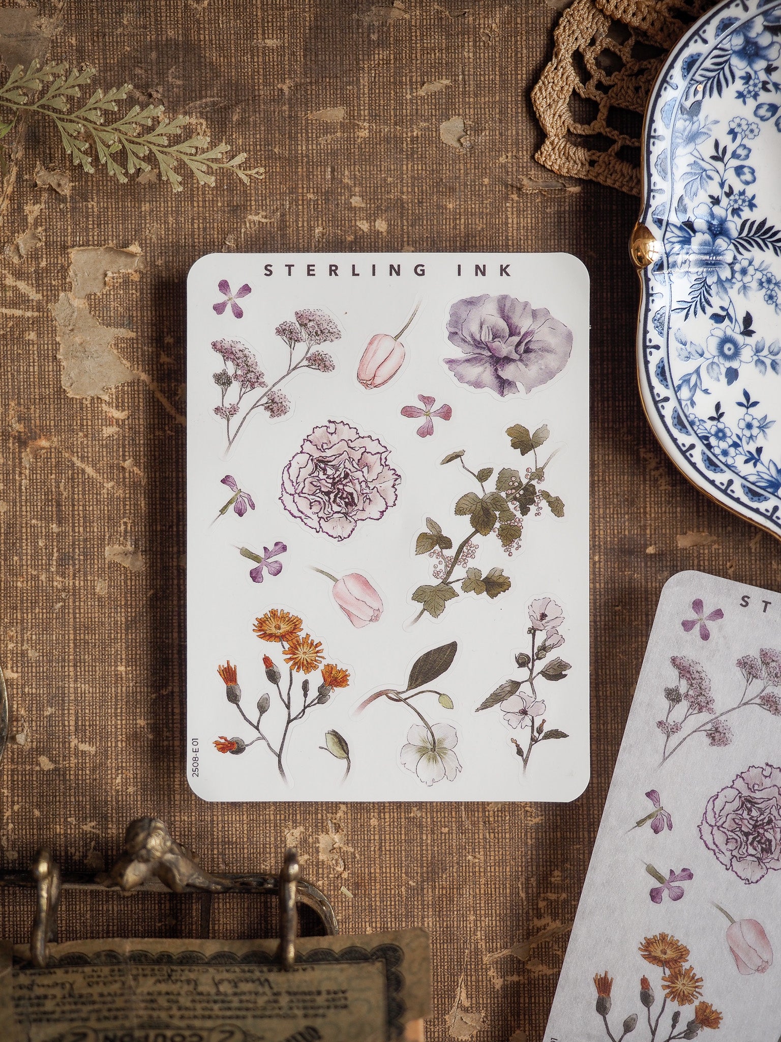 Elegant botanical sticker set featuring watercolor illustrations of delicate peonies, roses, and assorted floral elements in soft mauves, blush pinks, and greens.