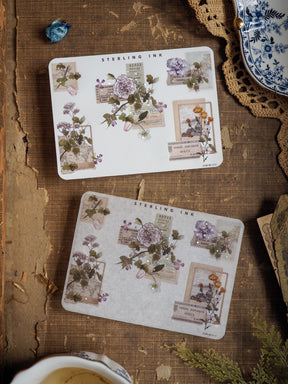 Vintage botanical corner stickers featuring muted floral patterns, detailed clusters of dusty purple blooms, and sepia-toned labels perfect for journaling.