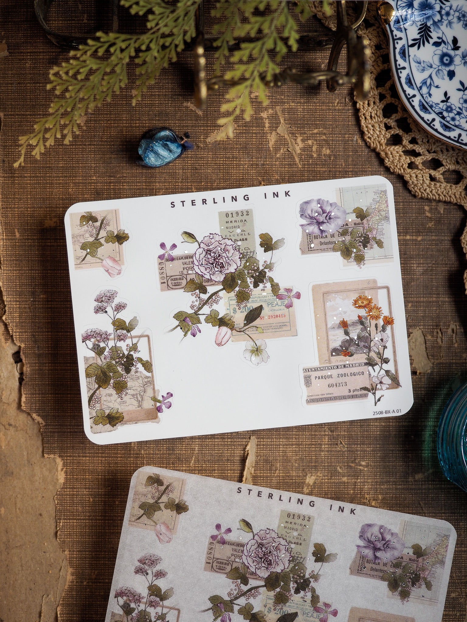 Archival sticker set featuring vintage botanical elements, decorative borders, and corner embellishments in muted purples and greens.