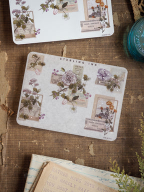 Sticker set featuring vintage botanical edges and corners with muted florals, antique illustrations, and delicate silver foil accents.