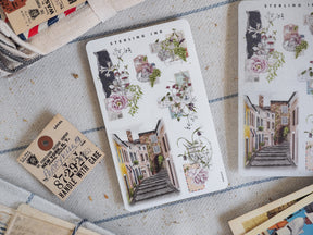 Detailed arrangement stickers for August 2024, featuring vintage florals, sepia-toned postcards, and charming Parisian streetscapes in soft, antique colors.