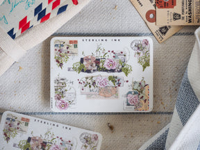 Vintage "Sterling Ink" sticker sheet featuring ornate edges and corners with delicate floral motifs, stamp details, and charming London scenes for crafting.