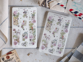 Elegant washi sticker strips featuring vintage watercolor floral designs, including soft pink roses, trailing greenery, and delicate date blocks.