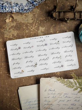 Black and brown structured stickers for planning, featuring all weekdays (Sunday through Saturday) printed on a vintage-toned, organized card.