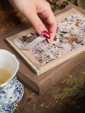 Vintage August 2025 planner stickers featuring delicate, faded floral prints and thin decorative strips for journaling and scrapbooking.