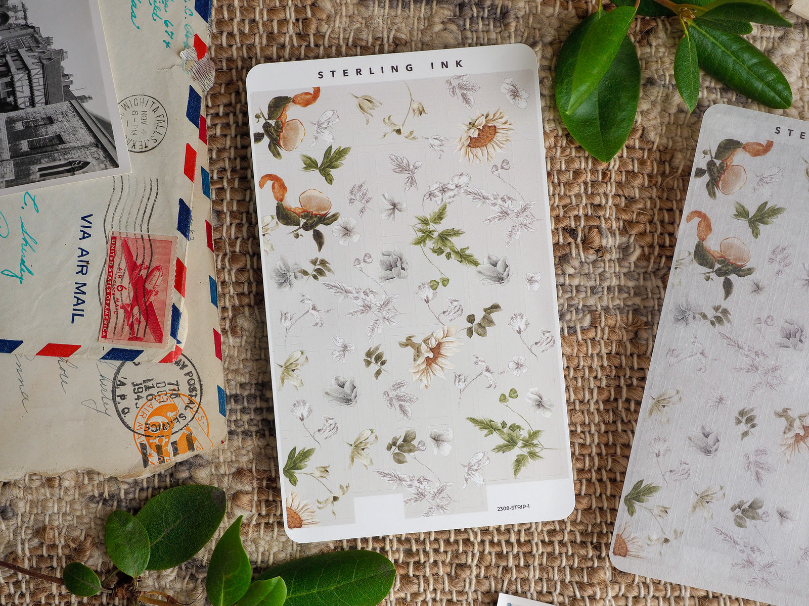 Delicate sticker sheet featuring a watercolor pattern of natural leaves, grasses, and golden wildflowers, ideal for journaling and scrapbooking decor.
