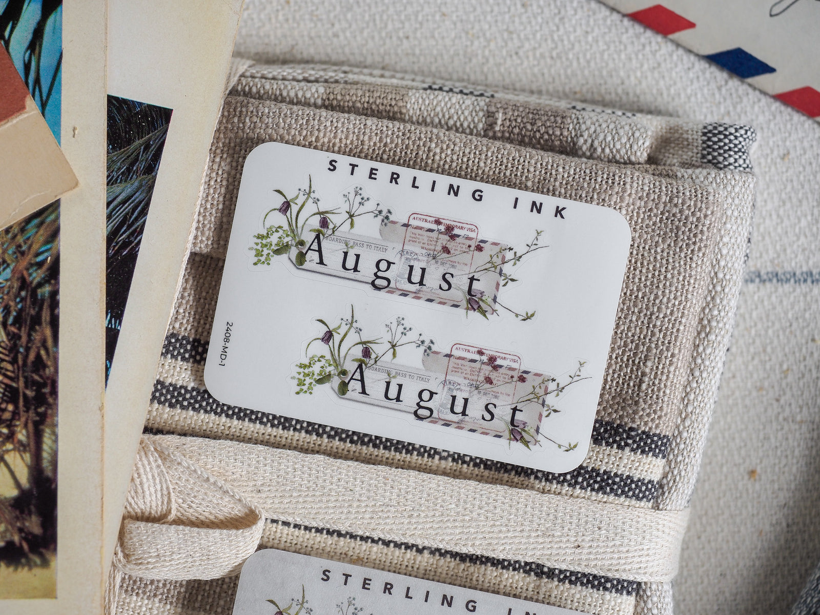 Elegant August month sticker featuring delicate vintage floral illustrations with green foliage and greenery, perfect for planner decorating and journaling.