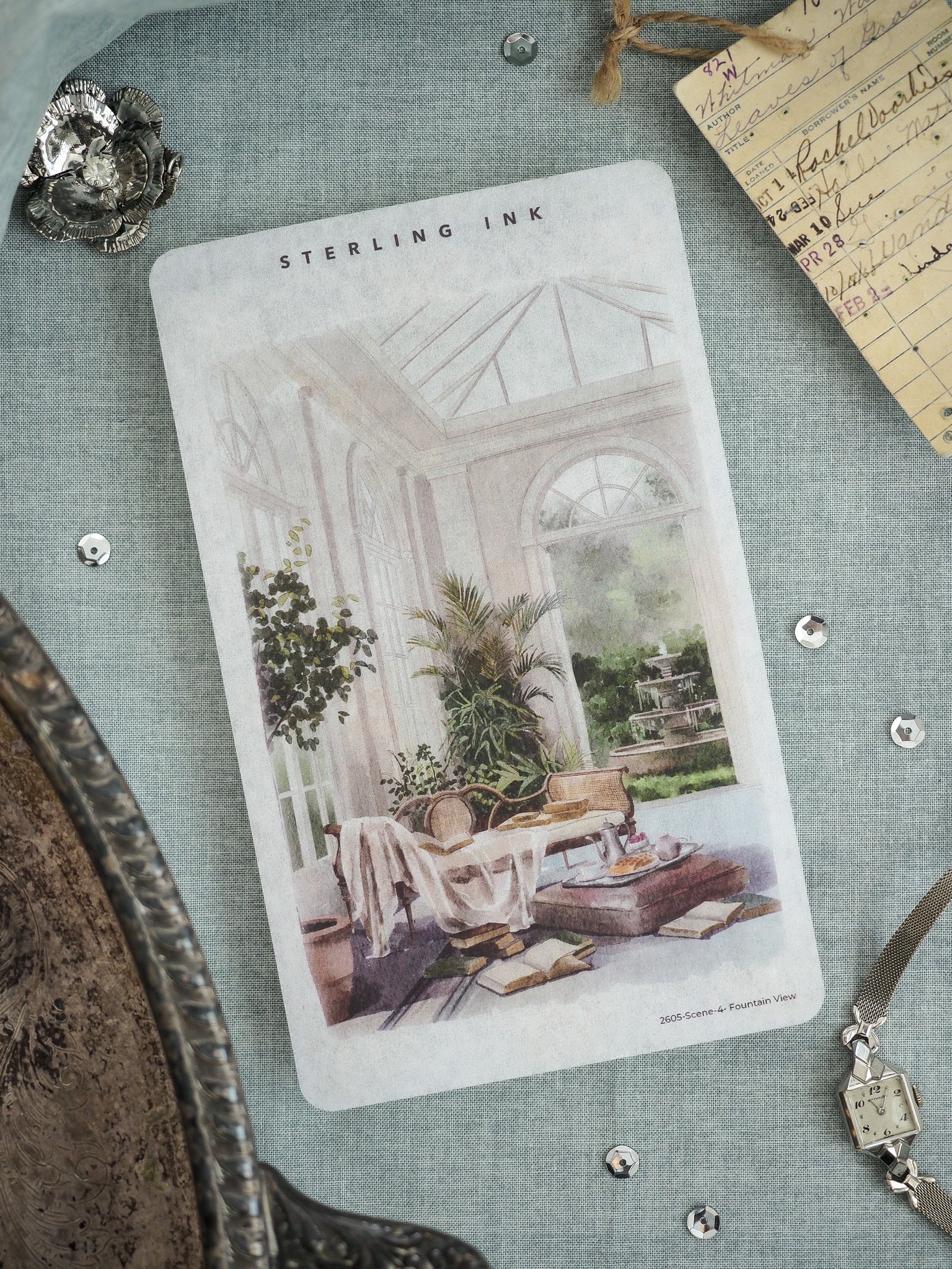 Detailed vintage watercolor illustration of a sun-drenched conservatory, featuring lush plants and an antique table, printed on "STERLING INK" elegant stationery.