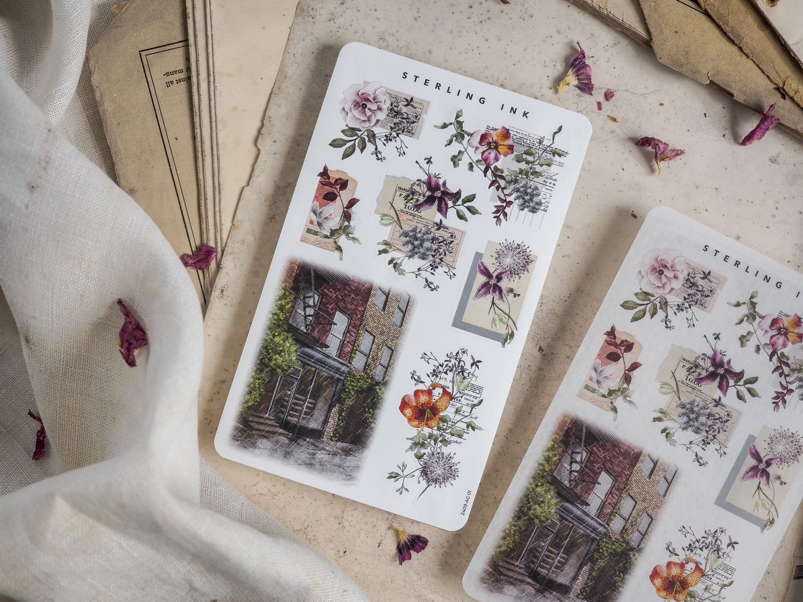 Botanical arrangement sticker sheets featuring vintage illustrations of rustic houses and curated floral bouquets perfect for September journaling.