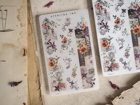 Vintage washi sticker assortment with detailed botanical stickers, incorporating muted floral motifs and distressed text designs perfect for journaling and scrapbooking.